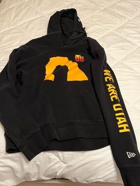 New Era Black Hoodie with Yellow Graphic